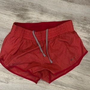 Red nike running shorts